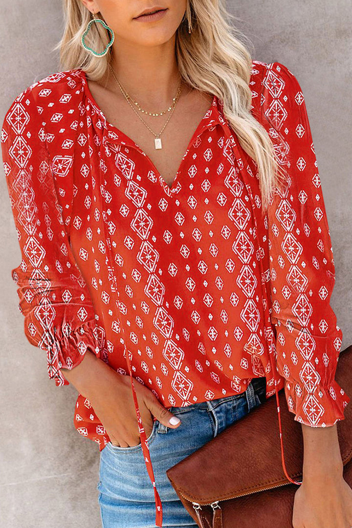 Damebluse med blomsterdesign og løse ærmer Stilla