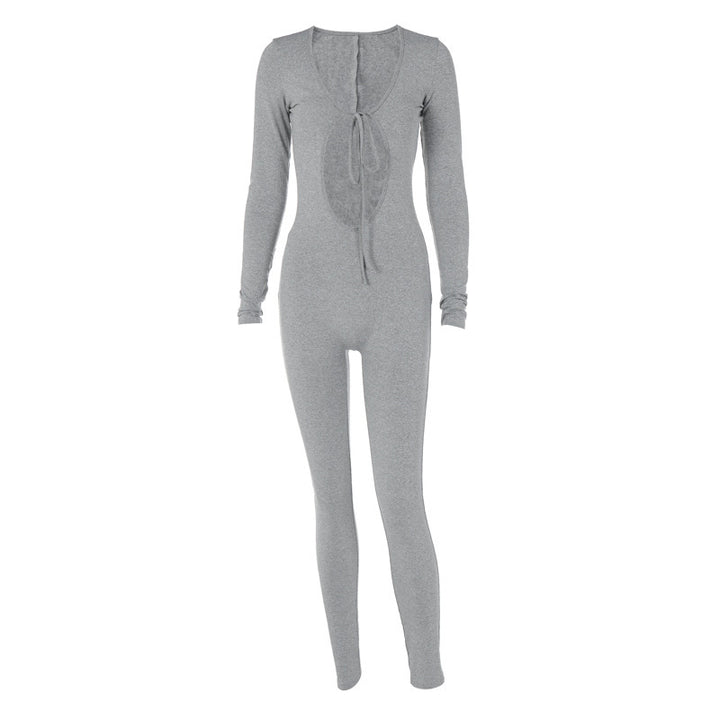 Dame figurbetonet jumpsuit med innovativt cut-out design og lange ærmer Stilla