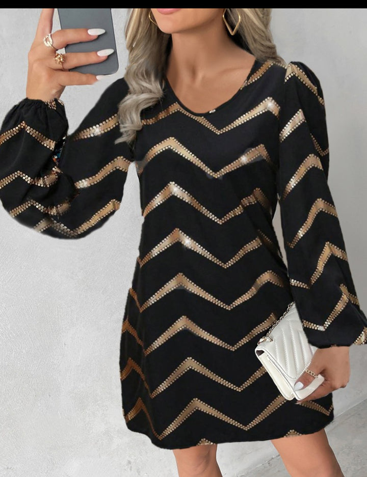 Dame stilfuld mini-kjole med skinnende zigzag-mønstre og puffærmer Stilla