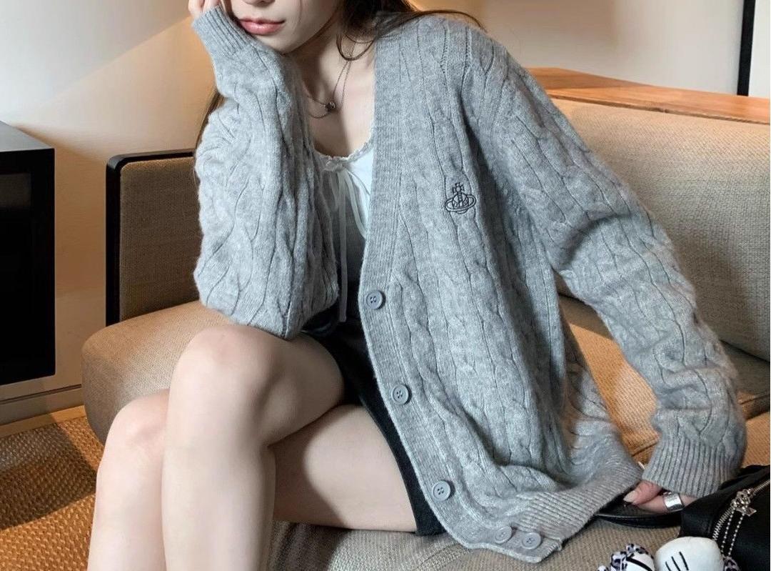Kvinders cardigan med kabelmønster og store knapper Stilla