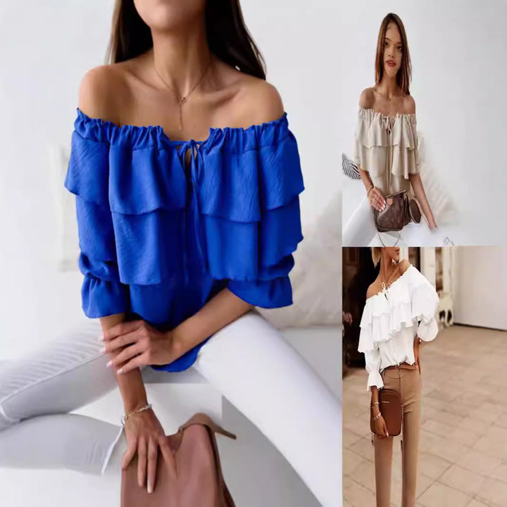 Dame top med ruffle-detaljer og åben skuldersøm Stilla