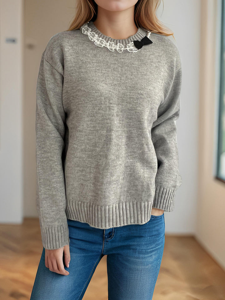 Kvinders hyggelige striktrøje med flæsedetaljer Stilla