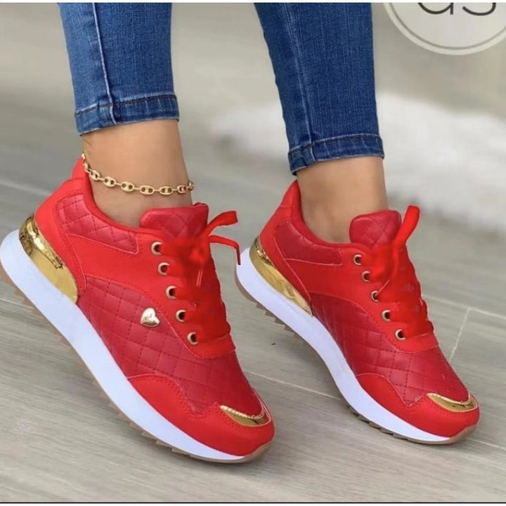 Dame sporty sneakers med elegant guldaccent og åndbart overmateriale Stilla