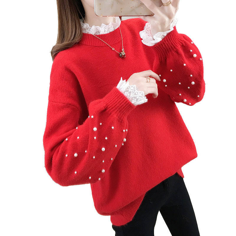 Dame trendy strikpullover med perledetaljer og voluminøse ærmer Stilla