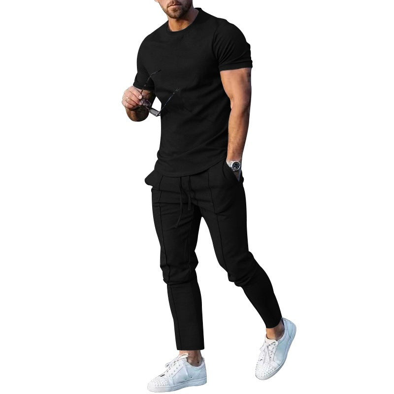 Herrer afslappet sport outfit med åndbart T-shirt og løs joggingbukser Stilla