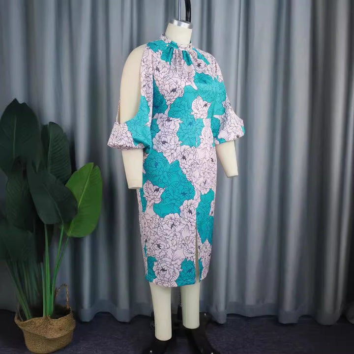 Dame elegant wrap dress with floral pattern and trendy cut-out sleeves Skovae