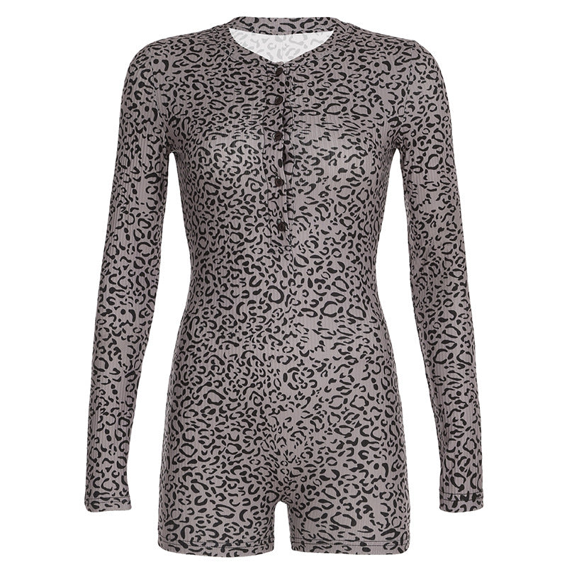 Dame jumpsuit med elegant leopardmønster og praktisk knaplukning Skovae