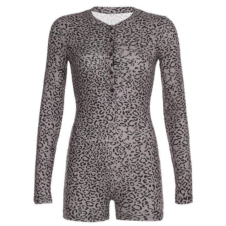 Dame jumpsuit med elegant leopardmønster og praktisk knaplukning Skovae