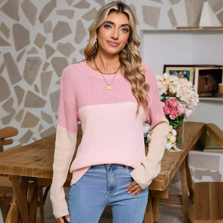 Dame strikket sweater i fashionable farveblok design Stilla