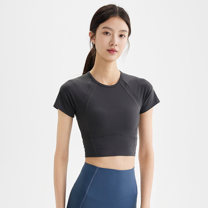 Dame sporty kortærmet crop-top med åndbare indsatser og elastisk pasform Stilla