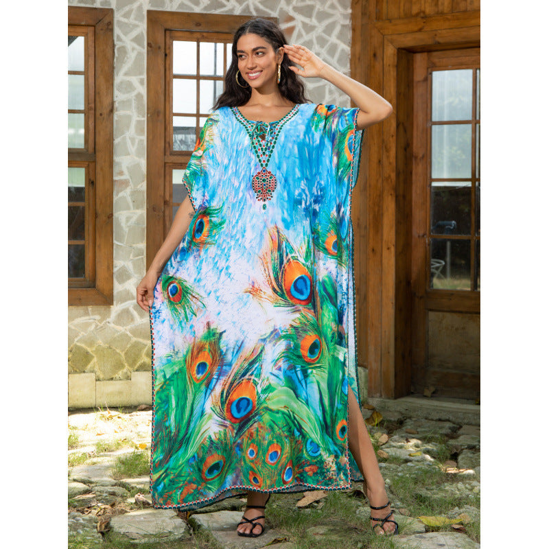 Dame Strandkaftan med kunstnerisk påfuglemotiv og fine detaljer Stilla