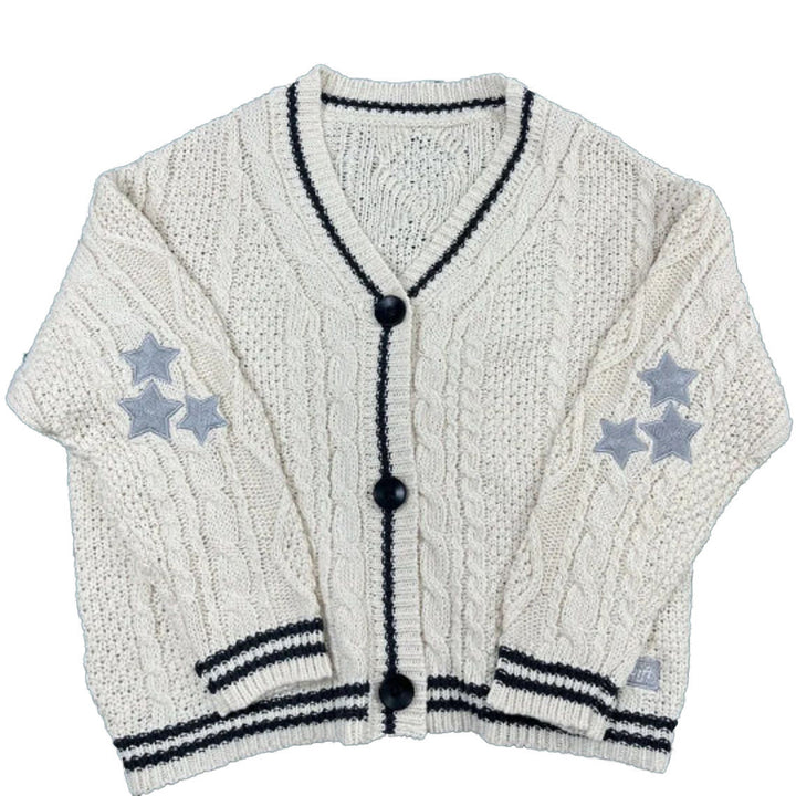 Kvinderens chunky strikkede cardigan med betydeligt kabelmønster og modebemærkninger Stilla