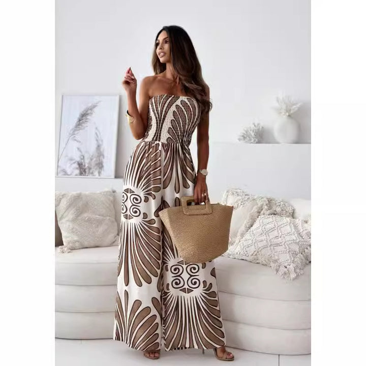 Damer bredskåret jumpsuit med stropløs design og elegant mønster Stilla