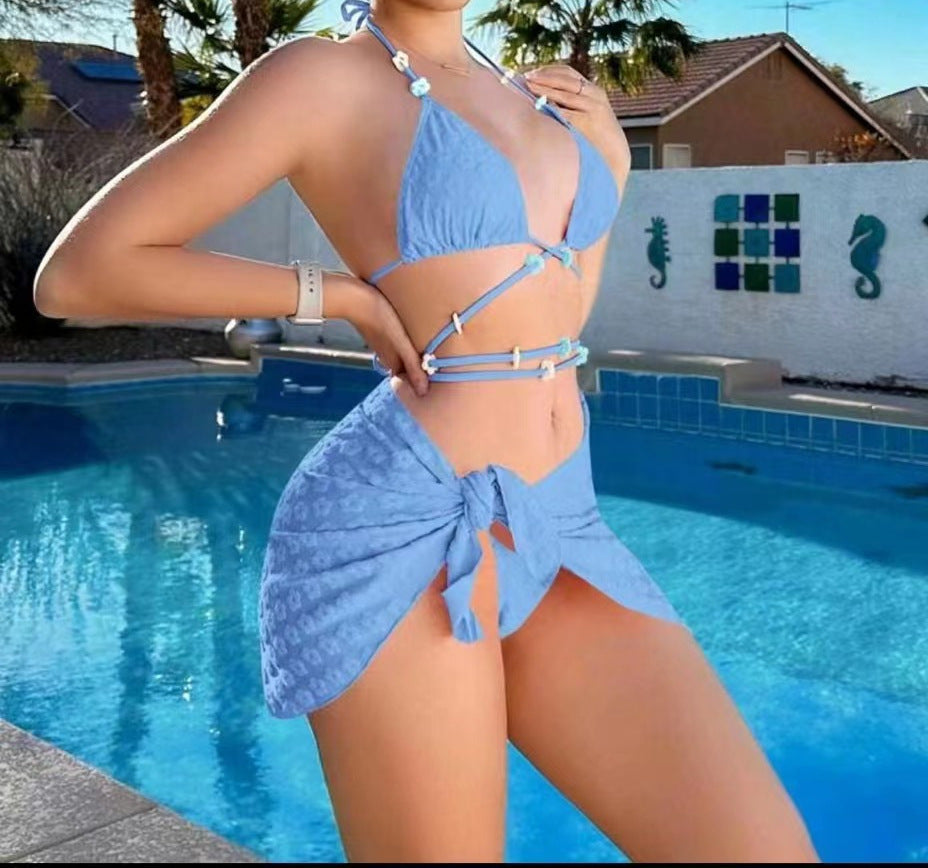 Dame triangel-bikini med moderigtig indpakningsskørt Skovae