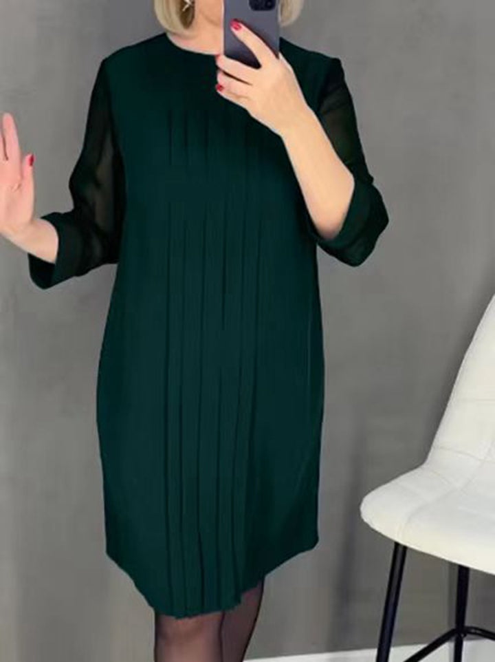 Dame elegant plisseret kjole med transparente ærmer og moderne snit Stilla