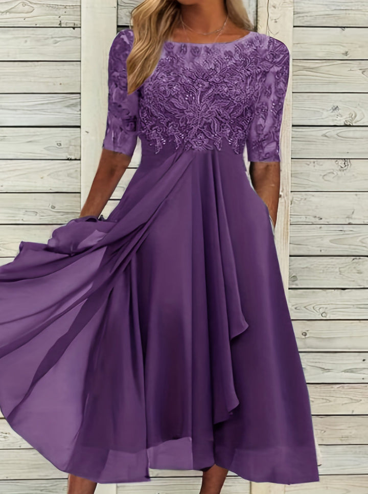 Damer na elegant chiffon midikjole med bestiklet spidsoberdel og halvlange ærmer Skovae