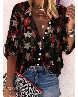 Damebluse i transparent spids med blomsterapplikationer og knapliste Stilla