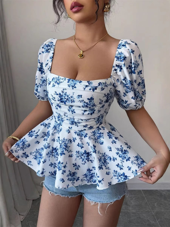 Dame Peplum-bluse med puffærmer og blomsterdesign Skovae
