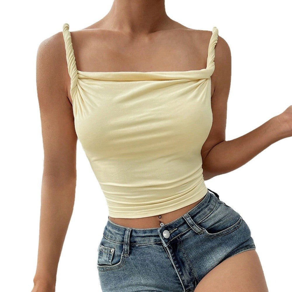 Kvindernes kropsnærende top med stilfuld drapering og off-the-shoulder design Stilla
