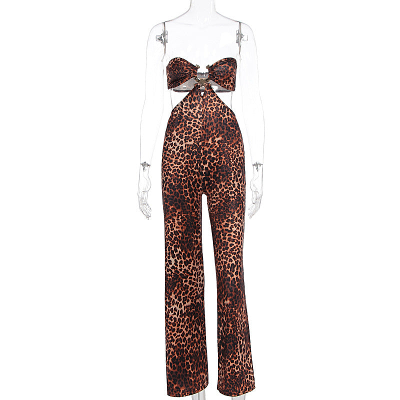 Dame jumpsuit med spændende leopardtryk og raffineret rygudskæring Skovae