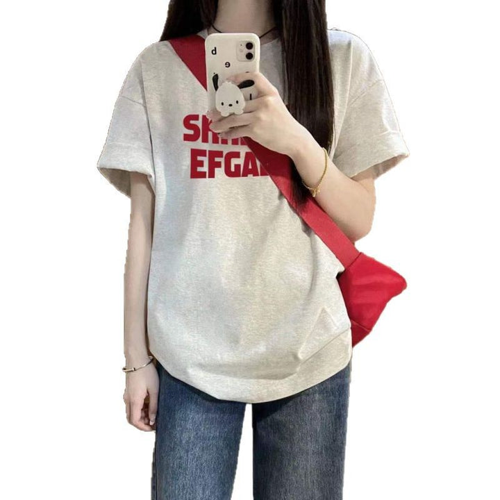 Dame Grafik T-shirt med afslappet tekst og afslappet snit Stilla