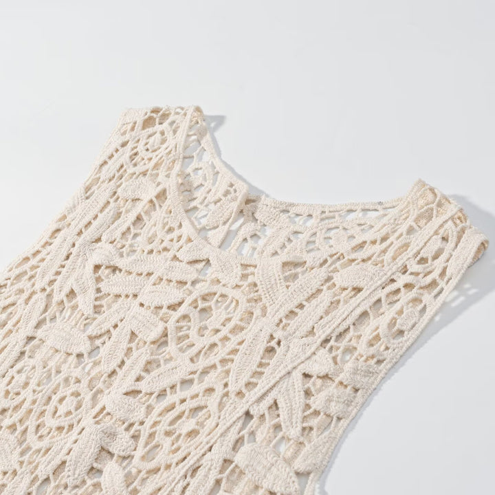 Dame spids blouse med asymmetrisk kant og florale mønstre Skovae