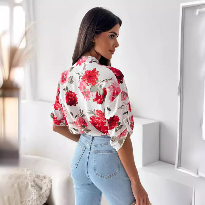 Damebluse med blomstermønster og dropped skuldre Stilla