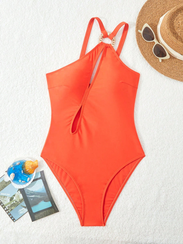 Dame badedragt med sporty cut-out og elegante detaljer Stilla