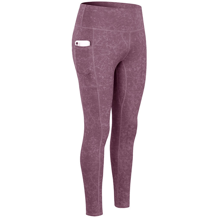 Dame Kvalitets Performance-Leggings med praktiske sidelommer og elastisk talje Stilla