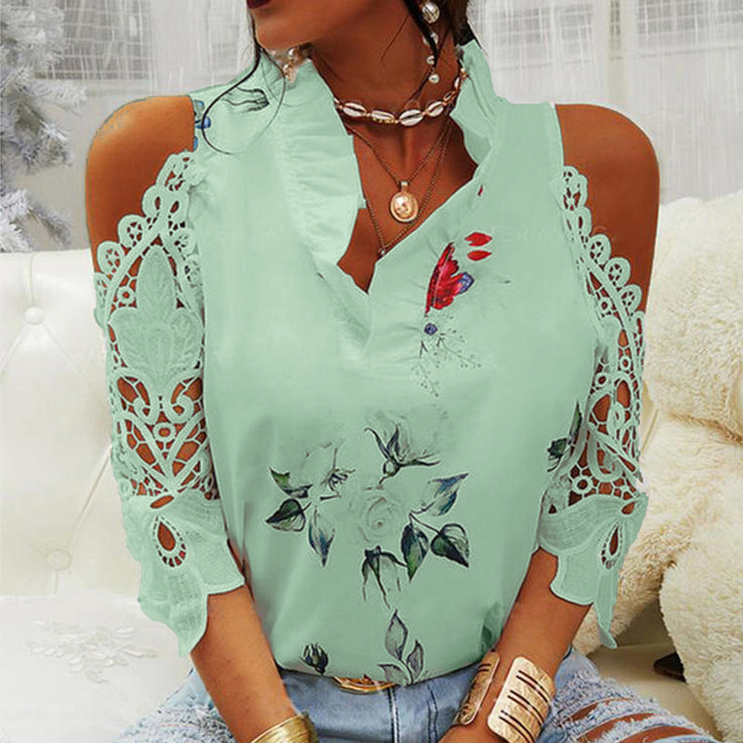Damebluse med cut-out-ærmer og spetsdetaljer Stilla