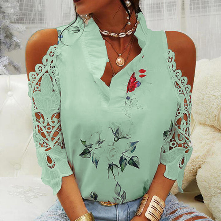 Damebluse med cut-out-ærmer og spetsdetaljer Stilla