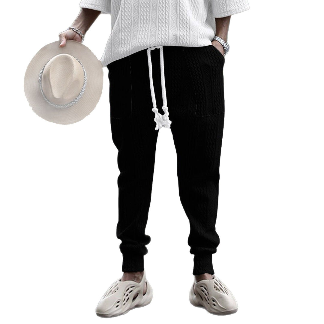 Herrer afslappet sommeroutfit med palmemotiveret overdel og åndbare joggingbukser Stilla