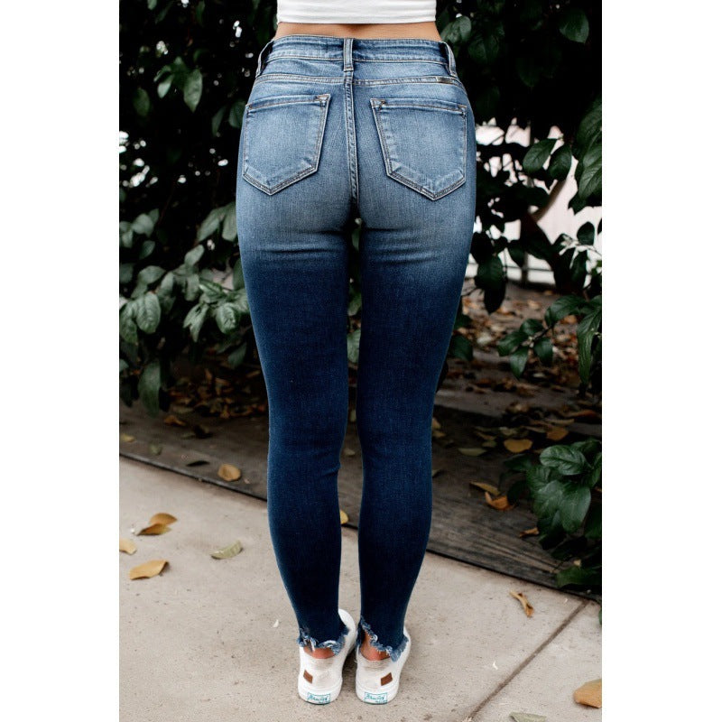 Femme Høj siddende revet Skinny Jeans med knap-liste Stilla