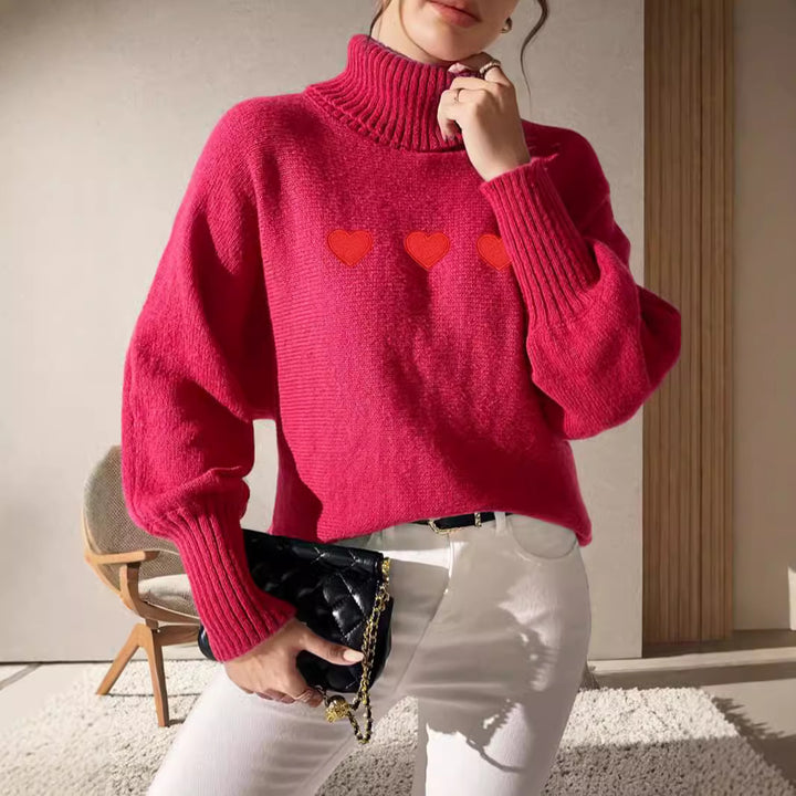 Kvinders sweater med høj krave og legende hjerteapplikationer Stilla