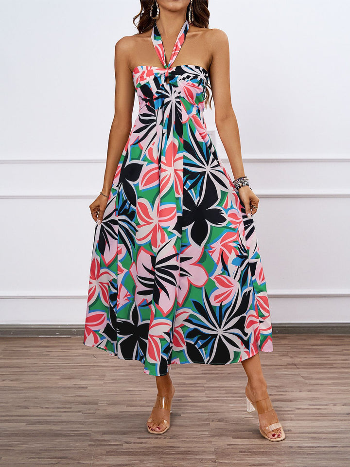 Dame maxikjole med skulderfri design og floral twist Stilla