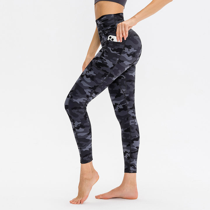Dame Kvalitets Performance-Leggings med praktiske sidelommer og elastisk talje Stilla