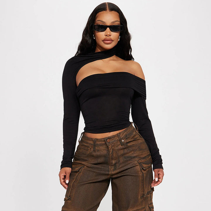 Dame mode top med asymmetrisk snit og elegant ruchesdetalje Skovae