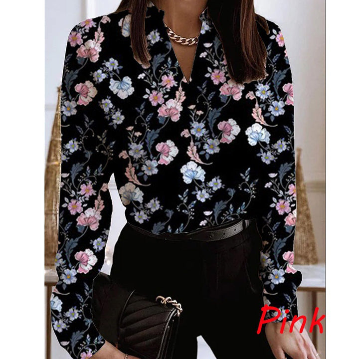 Damebluse med blomstret print og elegant krave Stilla