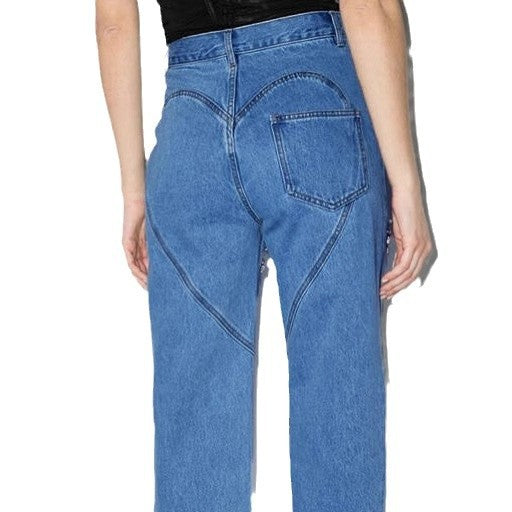 Dame jeans med ekstravagant snit og glitrende decorationer