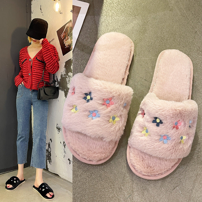 Dame pantofler med florale detaljer i blødt kunstpels Stilla