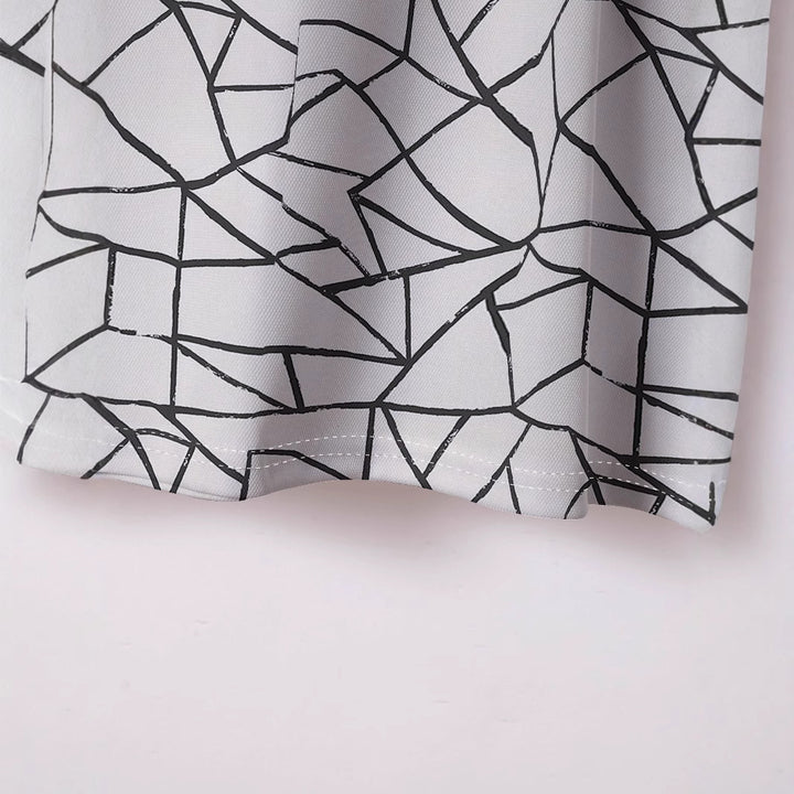 Herrer poloshirt med moderne geometrisk mønster og åndbart materiale Stilla