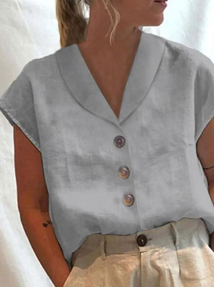 Dame let linned top med elegant knaplukning Stilla