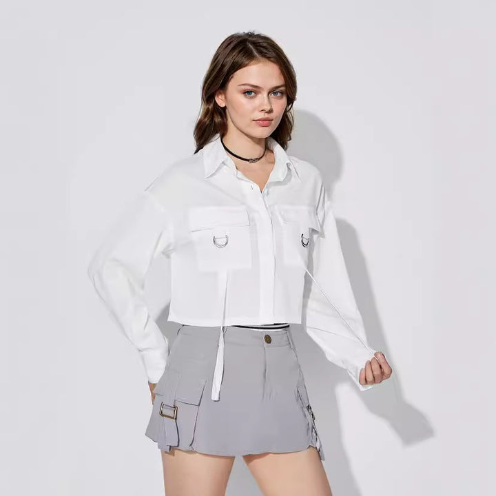 Kvinders cropped skjorte bluse med praktiske lommer og moderne detaljer Stilla