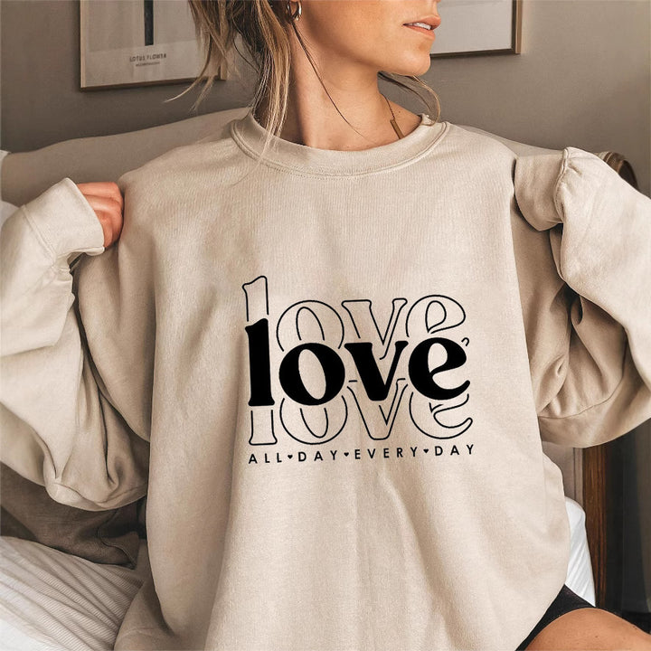 Kvinders sweatshirt med voluminøse ærmer og moderne kærlighedsprint Stilla
