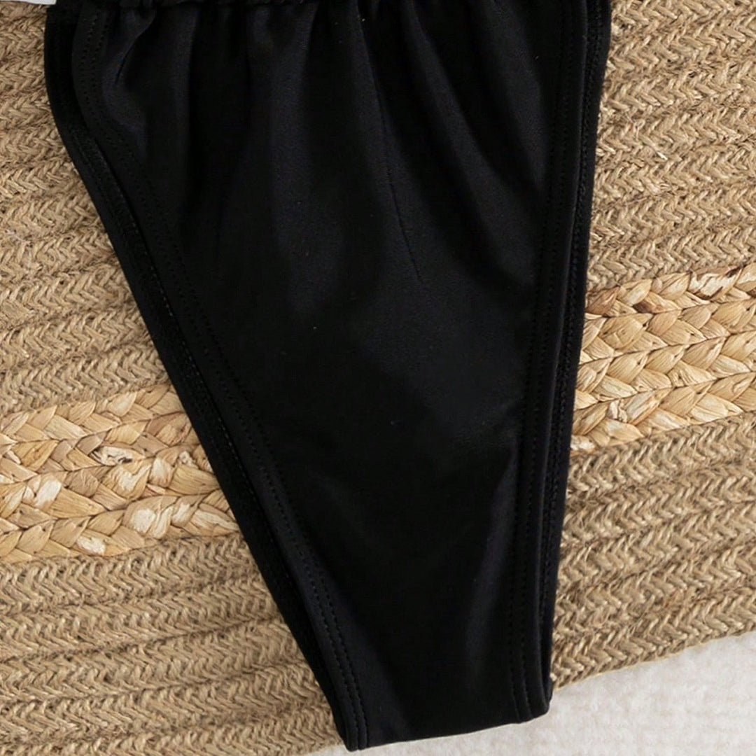 Dame triangel-bikini med justerbare stropper og feminint bindedetalje Skovae