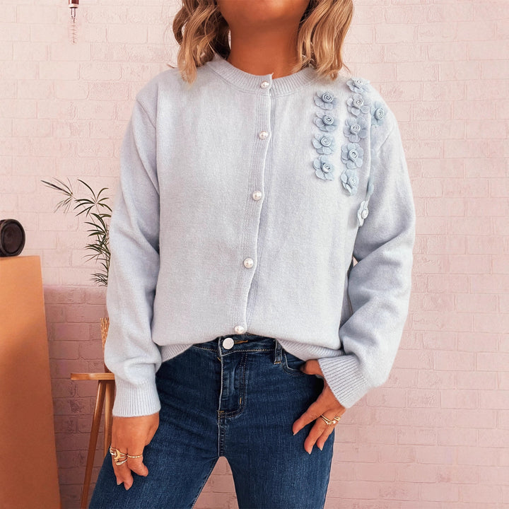 Kvinders cardigan med blomsterapplikationer og knapdetaljer Stilla