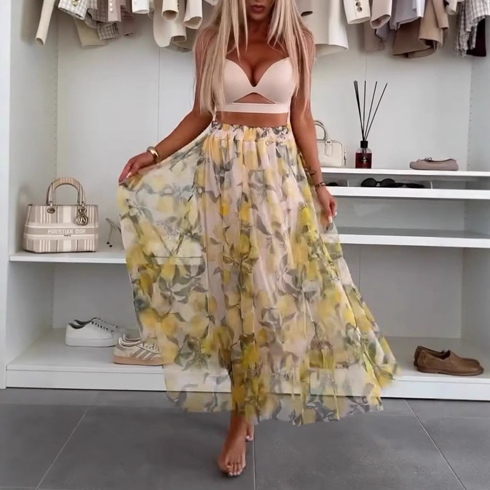 Dame Maxiskørt med florale lag og transparent design Stilla