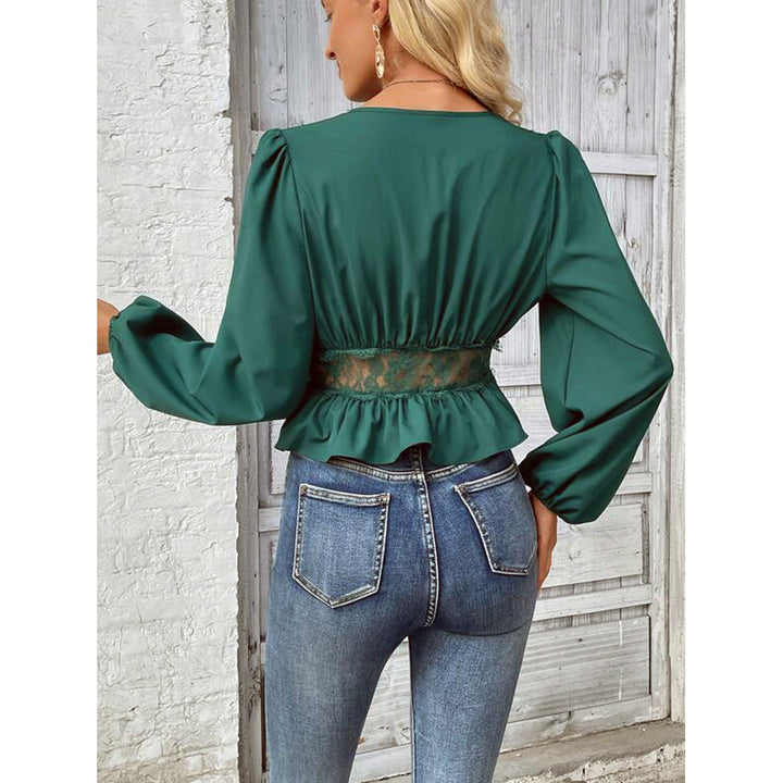 Damebluse med spidse detaljer og flatterende snit Stilla