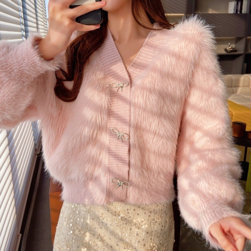 Kvinders fluffy cardigan med elegant knapdekoration Stilla