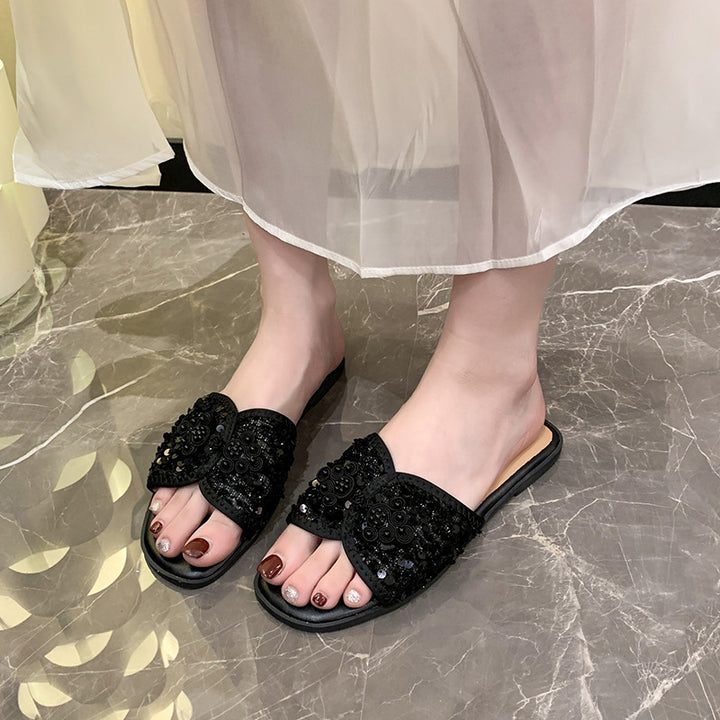 Dame nan elegante mule med kvadratisk tåparti bouclé-overmateriale og perleudsmykning Skovae